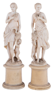 Lot 180: A pair of ivory sculptures depicting Greek goddesses Ceres and Chloris